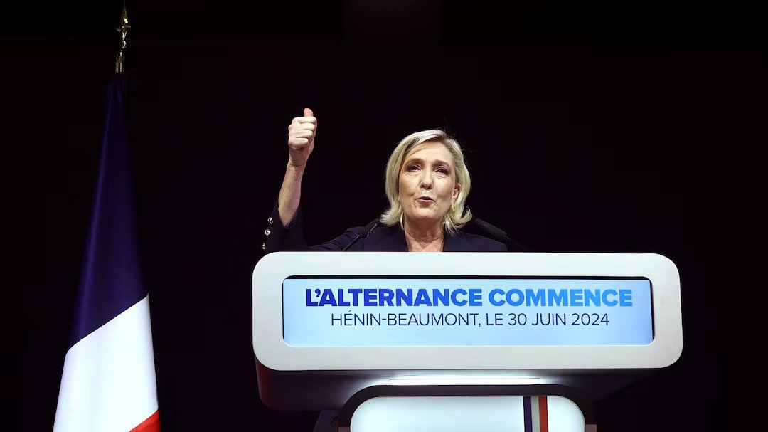 Marine Le Pen, French far-right leader and far-right Rassemblement National (National Rally - RN) party candidate, deliver a speech after partial results in the first round of the early French parliamentary elections in Henin-Beaumont, France, June 30, 2024. REUTERS