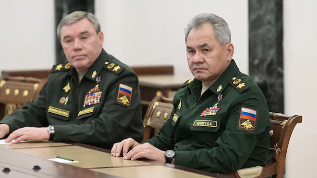 Russian Defence Minister Sergei Shoigu and Chief of the General Staff of Russian Armed Forces Valery Gerasimov attend a meeting with Russian President Vladimir Putin in Moscow, Russia February 27, 2022. Sputnik/Aleksey Nikolskyi/Kremlin via REUTERS/File Photo