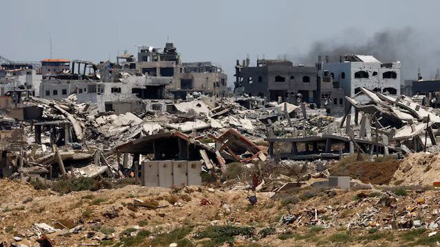 Destroyed buildings are pictured in Gaza, amid the ongoing conflict between Israel and Hamas, as seen near the Gaza coast, June 25, 2024. REUTERS/Amir Cohen/File Photo