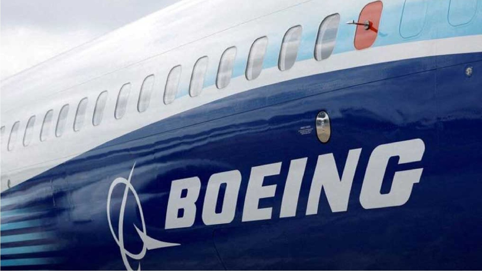 The Boeing logo is seen on the side of a Boeing 737 MAX at the Farnborough International Airshow, in Farnborough, Britain, July 20, 2022. REUTERS